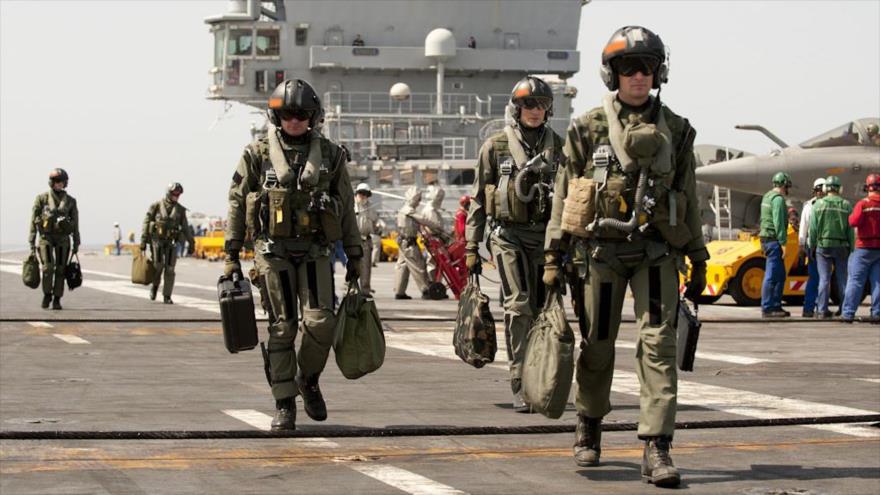 Los pilotos de la Organización del Tratado del Atlántico Norte (OTAN), a bordo de un portaaviones.