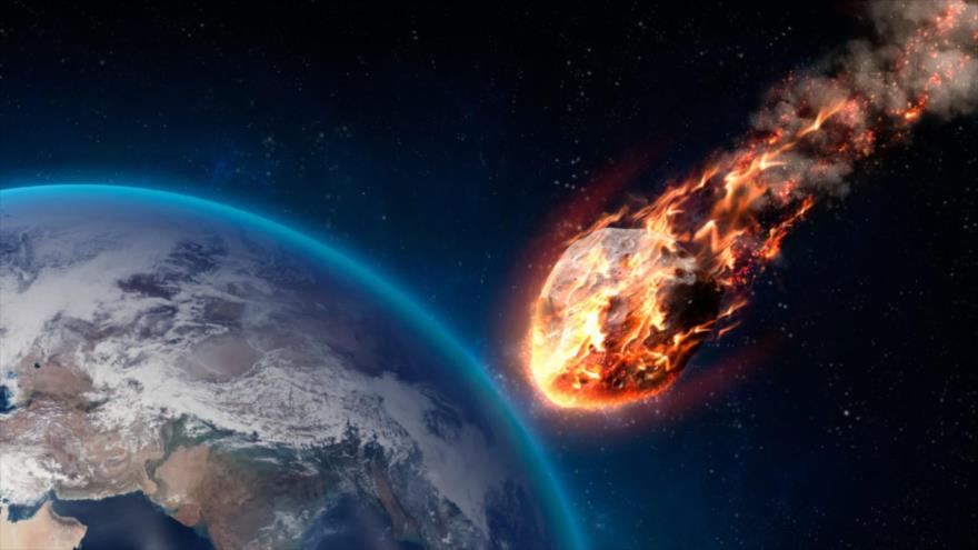 Imagen ilustrativa de un asteroide acercándose a la Tierra.
