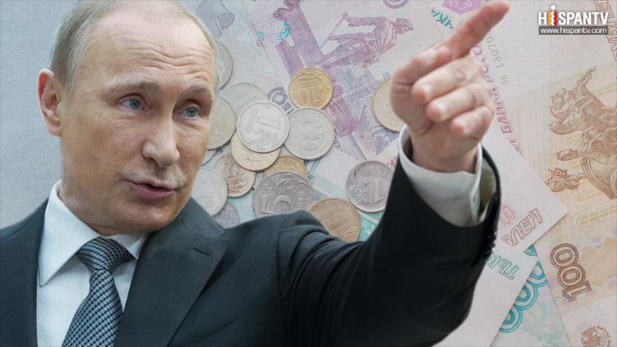 El presidente ruso, Vladímir Putin, ordena sustituir el dólar estadounidense con el rublo en el comercio interno.