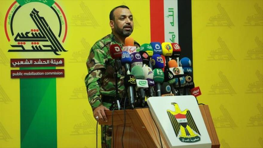 Ahmad al-Asadi, el portavoz de las Unidades de Movilización Popular (Al-Hashad Al-Shabi, en árabe), durante una rueda de prensa.