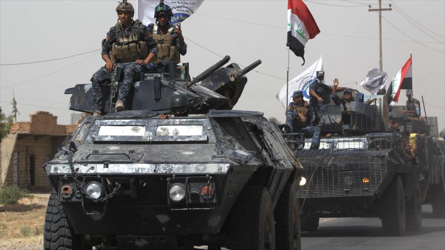 Vehículos blindados del Ejército iraquí, desplegados en Al-Hawija, en la provincia norteña de Kirkuk, 23 de septiembre de 2017.