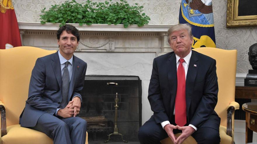 El presidente de EE.UU., Donald Trump, (dcha.) junto al primer ministro canadiense, Justin Trudeau, en Casa Blanca, Washington, 11 de octubre de 2017.