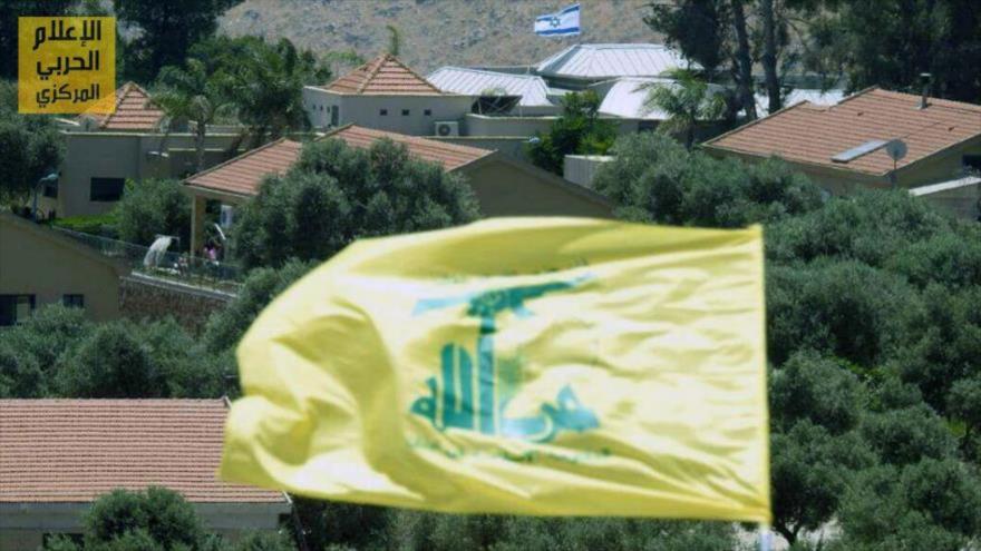 La bandera de Hezbolá ondeando en uno de los asentamientos ilegales israelíes.
