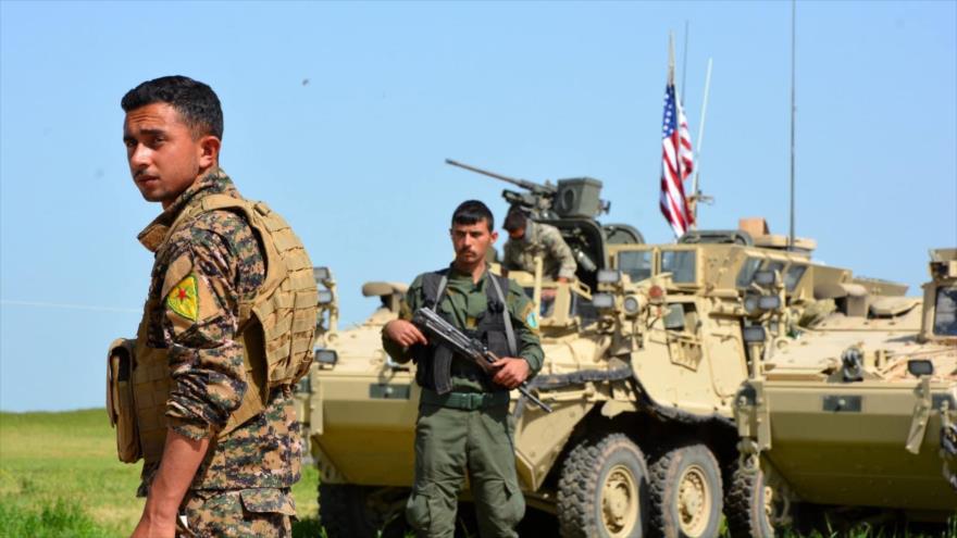 Fuerzas de las Unidades de Protección Popular (YPG, en kurdo) equipadas con vehículos blindados de EE.UU., abril de 2017.