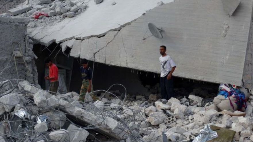 Una casa dañada por el ataque de la coalición anti-EIIL en la provincia noroccidental de Alepo 