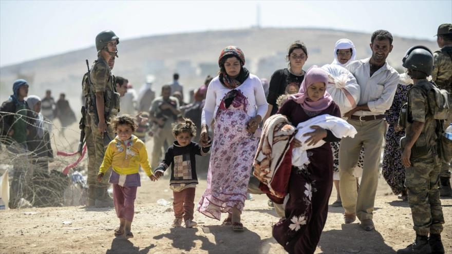 Los refugiados sirios huyendo de los conflictos en Kobani