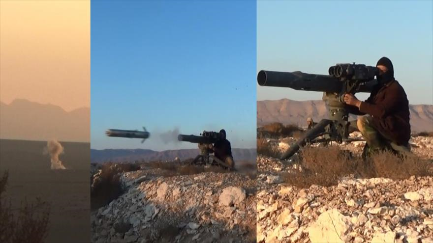 Un miembro del grupo terrorista EIIL (Daesh, en árabe) dispara un misil antitanque de fabricación estadounidense TOW en la región siria de Al-Qalamun