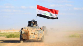 Ejército iraquí iza la bandera de Irak en Gran Mezquita de Tikrit