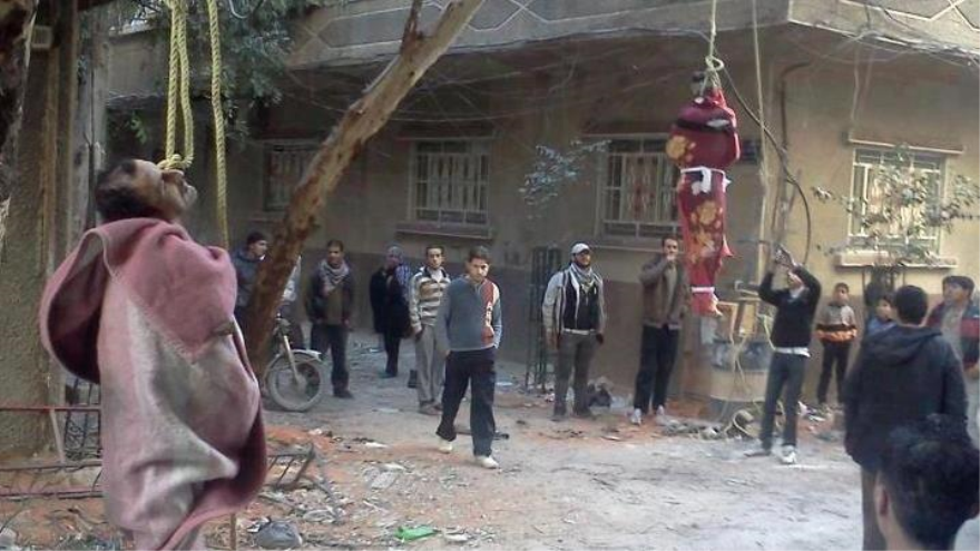 Palestinos ahorcados por EIIL en el campo de Al-Yarmuk