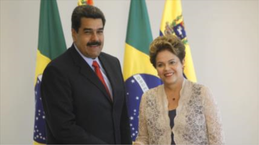 La presidenta de Brasil, Dilma Rousseff, junto a su homólogo venezolano, Nicolás Maduro