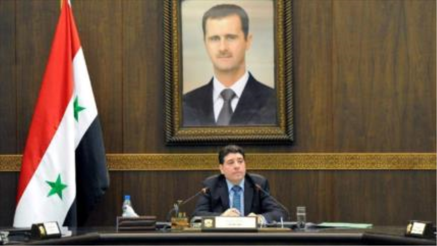 El primer ministro de Siria, Wael al-Halqi