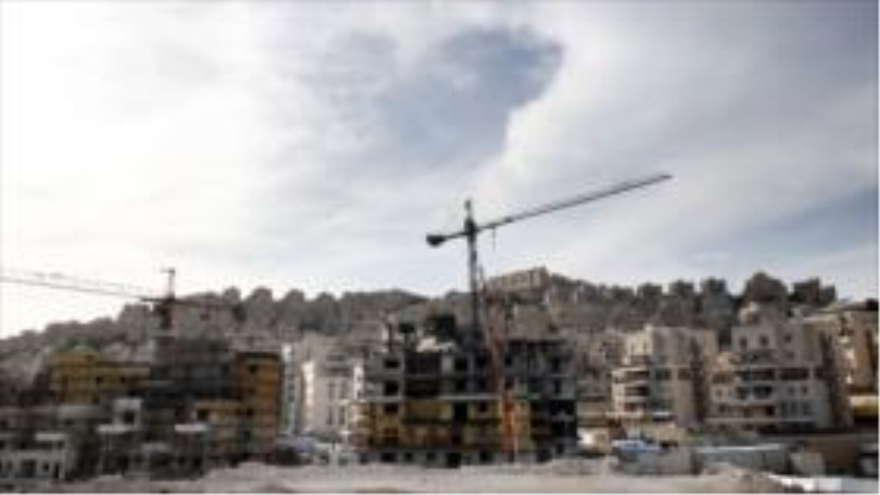 Una vista general de las viviendas ilegales en construcción en el asentamiento israelí de Har Homa en el este de Al-Quds. 25 de marzo de 2015.