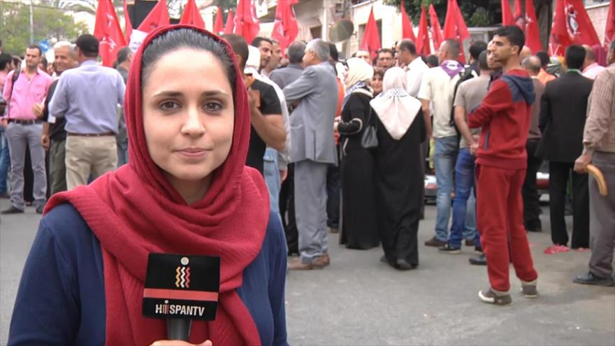 Palestinos se congregan en Gaza para exigir justicia por Al-Isawi