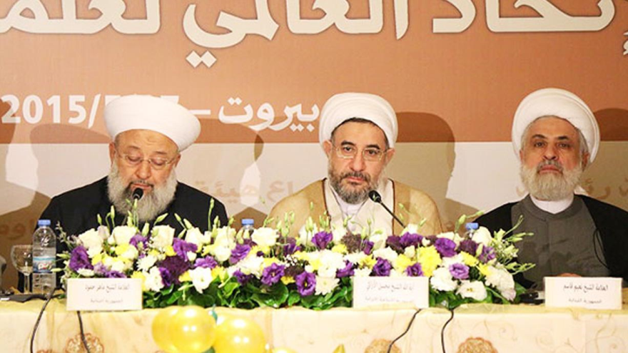 El sheij Maher Hamud, secretario general del Consejo de Ulemas de la Resistencia (izquierda). 27 de mayo de 2015