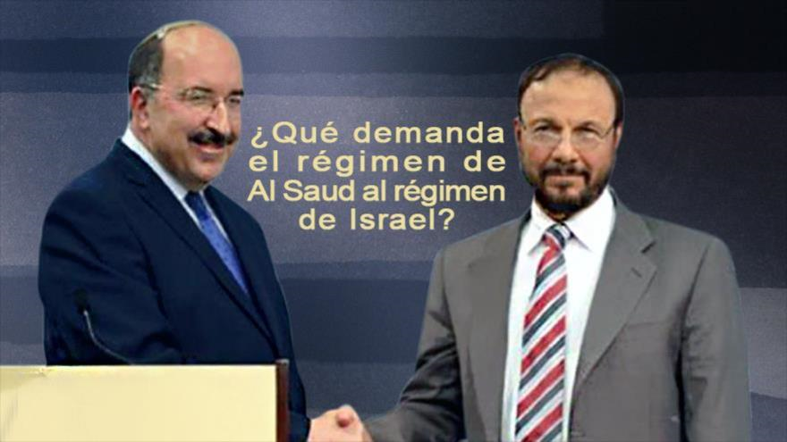 Gold (izquierda) da la mano a Eshki (derecha) en un evento en Consejo de Relaciones Exteriores en Washington.