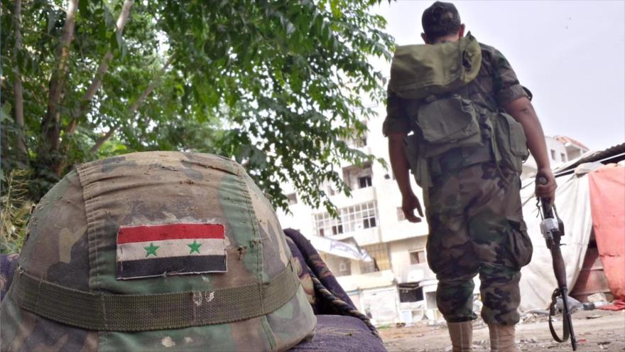 Un soldado del Ejército sirio en la ciudad de Homs
