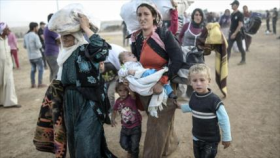 Fuerzas kurdas en Kobani liberan a 100 rehenes de EIIL