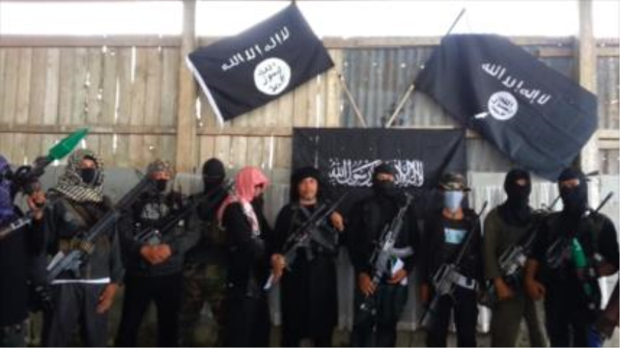 Miembros del grupo terrorista takfirí EIIL (Daesh, en árabe)
