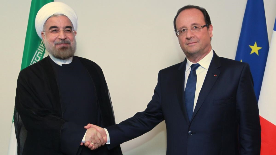 Los presidentes de Irán, Hasan Rohani (izda), y de Francia, François Hollande.