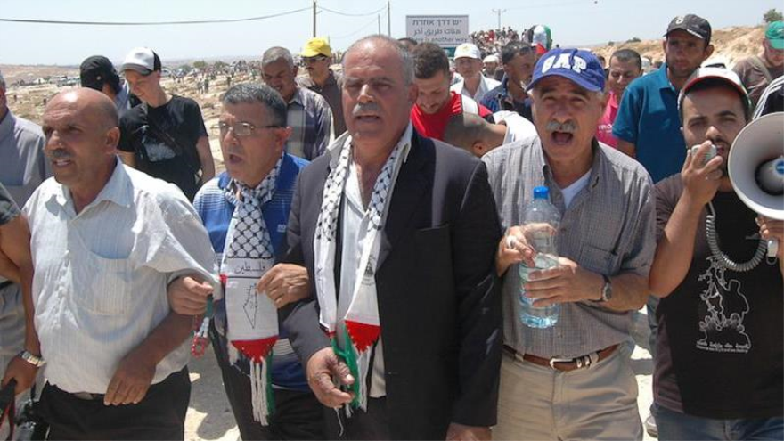 Protesta de activistas palestinos y extranjeros en contra de la demolición de la aldea palestina de Susiya, 24 de julio de 2015.
