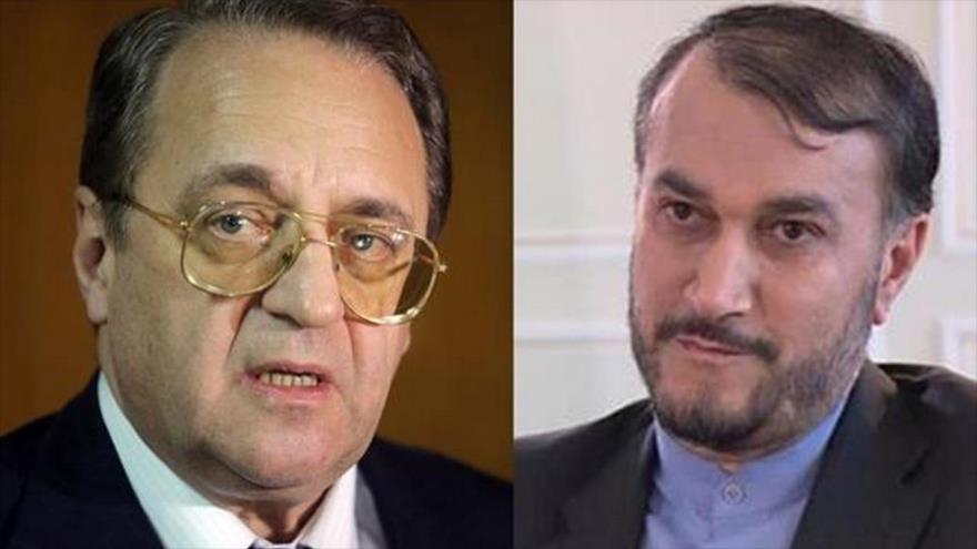 El vicecanciller iraní para Asuntos Árabes y Africanos, Husein Amir Abdolahian (dcha.), y el vicecanciller ruso, Mijail Bogdanov.