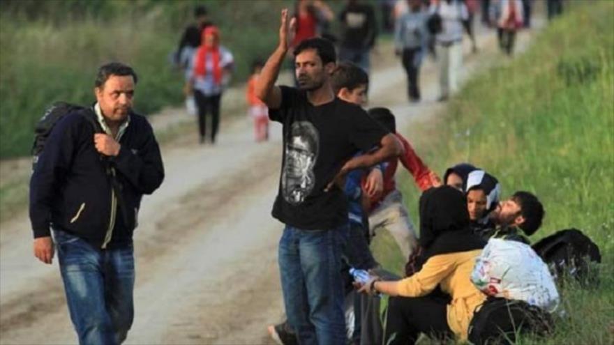Un grupo de refugiados sirios en la frontera entre Serbia y Croacia.