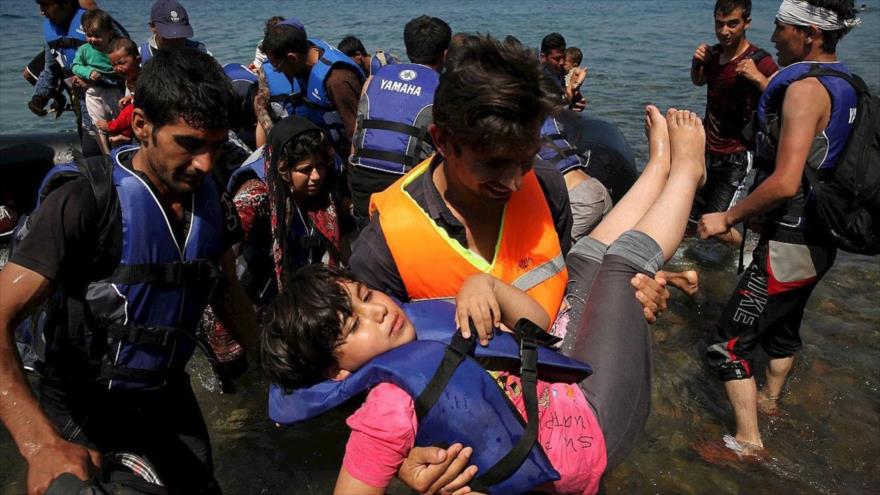 Refugiados afganos llegan a la isla griega de Lesbos. 6 de agosto de 2015