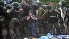 HRW denuncia la violencia policial contra refugiados en Macedonia