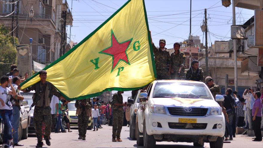 Combatientes de las Unidades de Protección Popular (YPG) en la ciudad siria de Qamishli (noreste).