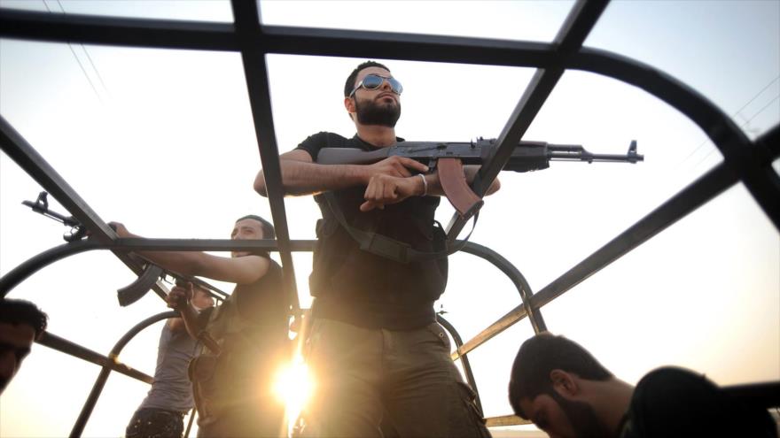 Un grupo de terroristas activos en Siria a los que Occidente y sus aliados denominan "rebeldes moderados".