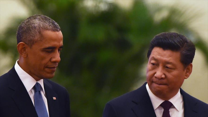 El mandatario chino, Xi Jinping (drcha.), junto a su par estadounidense, Barack Obama.
