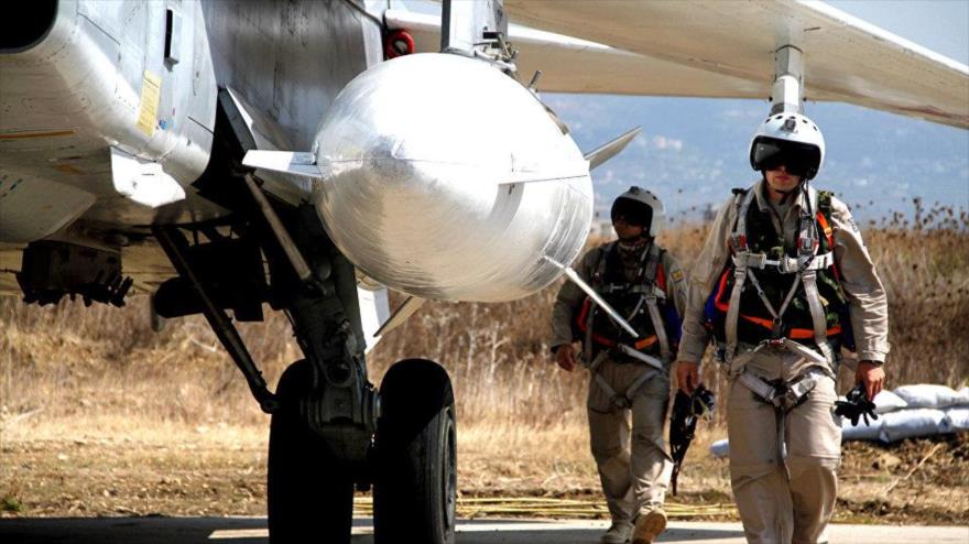 Pilotos rusos antes de iniciar una operación antiterrorista desde una base aérea en la ciudad costera siria de Latakia.