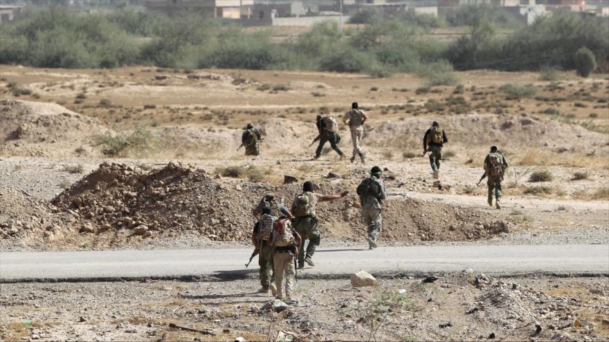 Fuerzas populares, que luchan junto al Ejército iraquí, avanzan hacia el centro de Biyi, en el norte de Tikrit (capital de la provincia de Salah al-Din, centro).