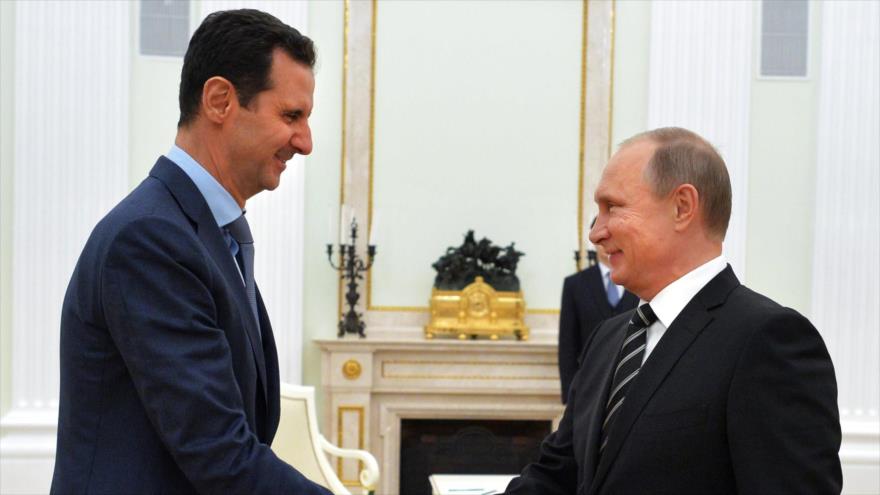 Presidente sirio, Bashar al-Asad (izqda.), y su par ruso, Vladimir Putin (dcha.), se reúnen en el Kremlin. 20 de octubre de 2015