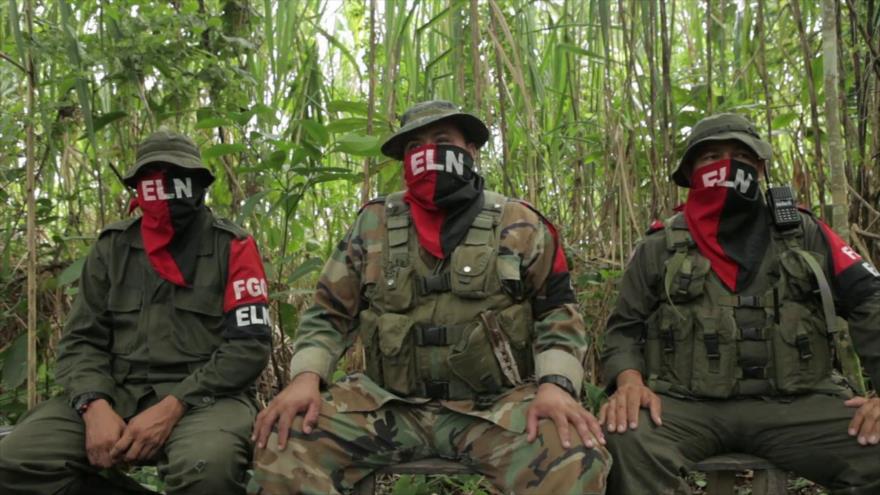 Tres guerrilleros del Ejército de Liberación Nacional (ELN).