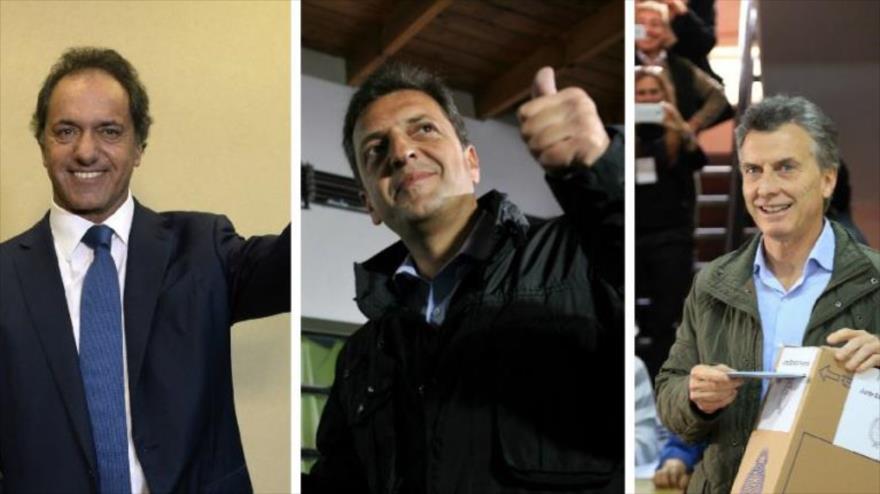 El líder del partido oficialista FpV, Daniel Scioli (Izq); Sergio Massa, de UNA, y Mauricio Macri, de la coalición conservadora Cambiemos.