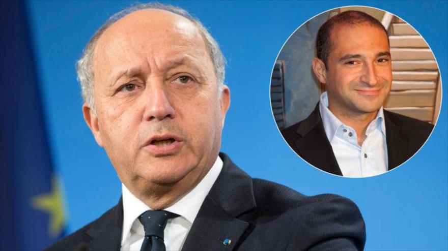 El canciller francés, Laurent Fabius (izqda.) y su hijo Thomas.