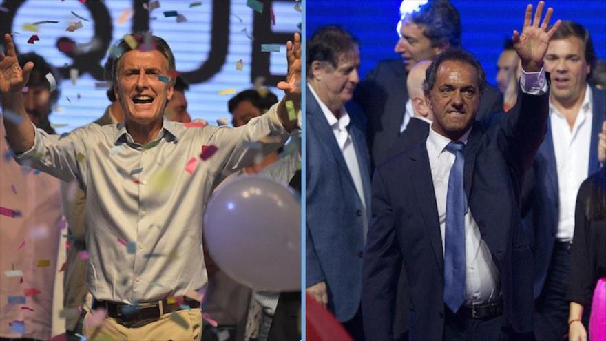 Daniel Scioli, candidato por el Frente para la Victoria (drcha.), rivalizará con Mauricio Macri, del conservador partido Cambiemos, en el balotaje por la Presidencia de Argentina.