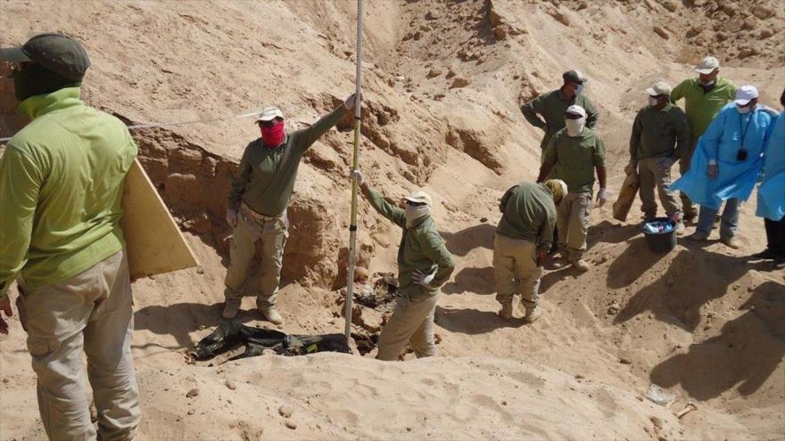 Fuerzas iraquíes descubren al menos 14 fosas comunes cerca de Tikrit