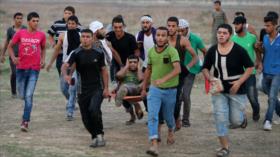 Soldados israelíes hieren a decenas de palestinos en Gaza