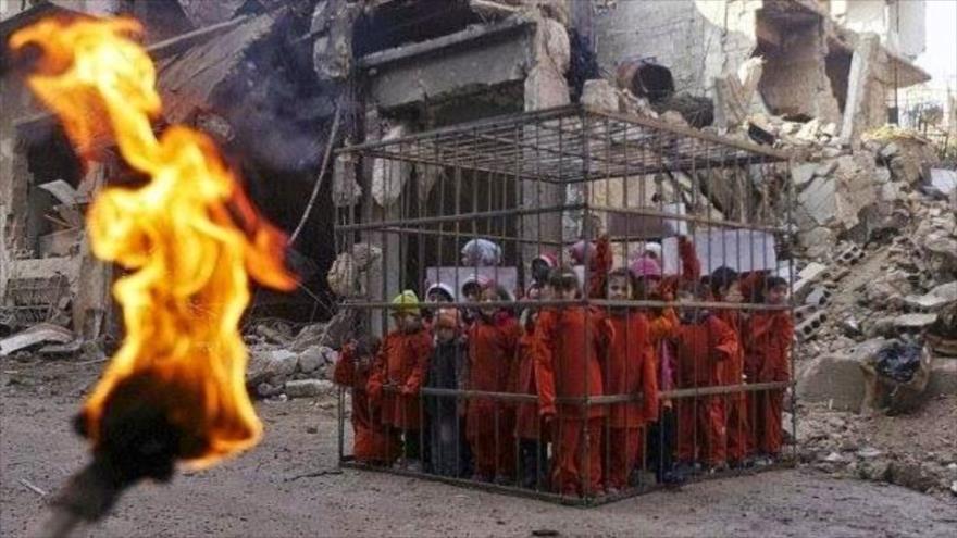 Integrantes del EIIL (Daesh en árabe) amenazan con quemar vivas mujeres y niños que tienen secuestrados.