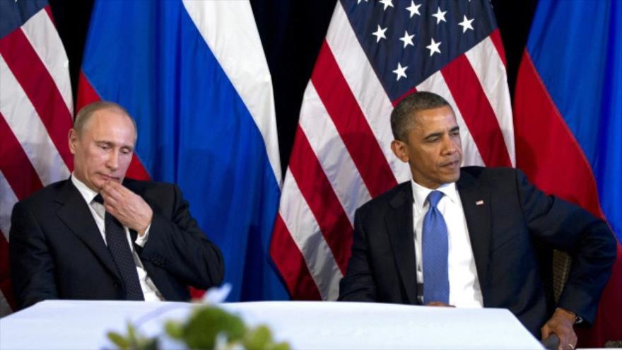 El presidente ruso, Vladimir Putin (izqda), y su par estadounidense, Barack Obama.