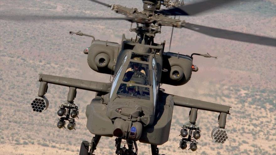 Video subido a Internet muestra cómo un helicóptero Apache estadounidense escolta caravana de terroristas en Siria.