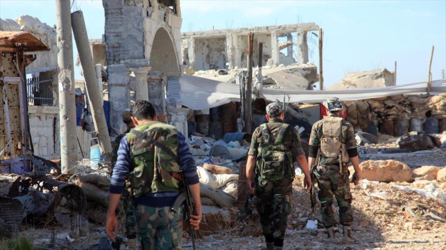 Soldados del Ejército sirio en las afueras de la ciudad de Alepo.