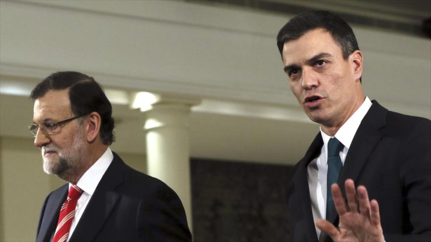 El presidente del Gobierno español, Mariano Rajoy (izda.), y el líder del PSOE, Pedro Sánchez.