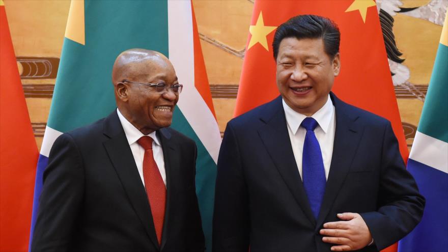 Los presidente de China y Sudáfrica, Xi Jinping (dcha.), y Jacob Zuma, respectivamente.