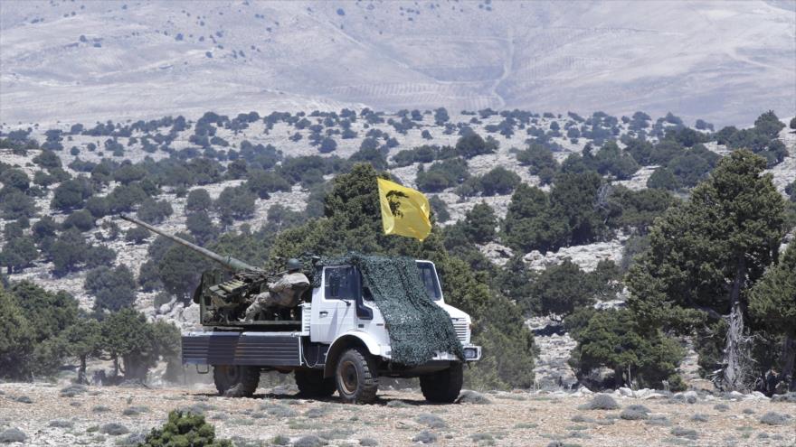 Unidades militares de Hezbolá durante batallas con los grupos terroristas cerca de la frontera sirio-libanesa.