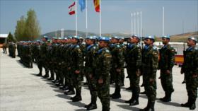 Militares españoles desplegados votan en masa, los expatriados no pueden