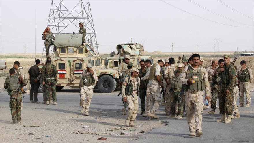 Fuerzas kurdas e iraquíes participan en una operación antiterrorista conjunta en las afueras de la ciudad de Kirkuk, 12 de junio de 2014.