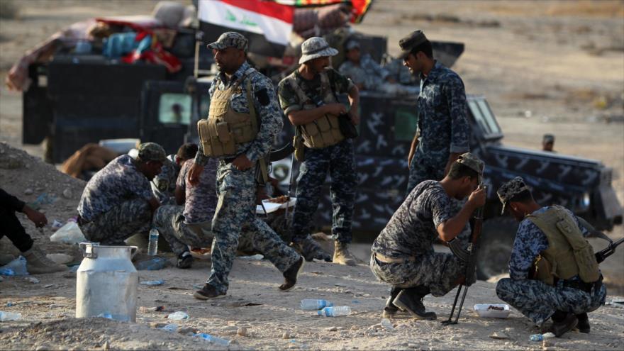 Los agentes de la policía iraquí cerca de Tikrit, capital de la provincia central de Salah al-Din.